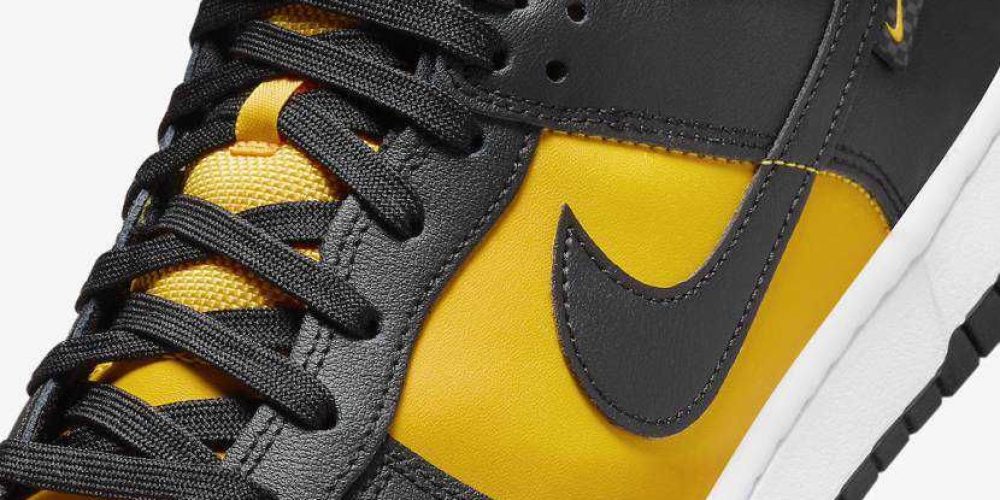 Nike Dunk Low “Black/University Gold”